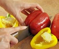 Female hands cut pepper Royalty Free Stock Photo