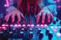 female hands of DJ girl mixes music on DJ console mixer at a night club in party