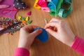 Female hands doing crafts from felt Royalty Free Stock Photo