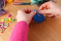 Female hands doing crafts from felt Royalty Free Stock Photo