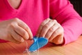 Female hands doing crafts from felt Royalty Free Stock Photo