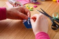 Female hands doing crafts from felt Royalty Free Stock Photo