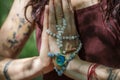 Female hands doing namaste mudra yoga practice in forest