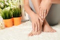 Female hands and feet with manicure and a pedicure Royalty Free Stock Photo