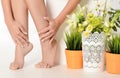 Female hands and feet with manicure and a pedicure Royalty Free Stock Photo