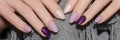 Female hands with glitter nail design. Purple nail polish manicure. Woman hands hold grey wool shawl. Banner ad