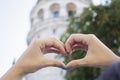 Female hands heart shape on city background Royalty Free Stock Photo