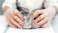 Female hands hold the dangerous mineral asbestos Royalty Free Stock Photo