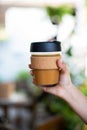 Female hands holding reusable coffee cup, Royalty Free Stock Photo