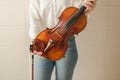 Female Hands Holding Beautiful Violin Fiddle and Bow