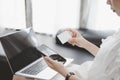 Female hands holding credit card and using laptop for online shopping Royalty Free Stock Photo