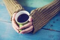 Female hands holding cup of coffee Royalty Free Stock Photo