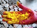 Female hands holding dry color powder Royalty Free Stock Photo