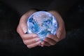 Female hands holding Earth in outer space, concept save the world Royalty Free Stock Photo