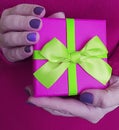 Female hands holding a gift box decoration celebration Royalty Free Stock Photo