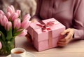 Female hands holding gift pink box, mother day , new year, birthday concept, generative ai
