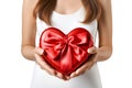 Female hands holding a heart-shaped gift. Royalty Free Stock Photo