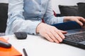 Female hands holding laptop  in office Royalty Free Stock Photo