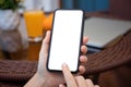 female hands holding phone with isolated screen background room Royalty Free Stock Photo