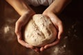 Female hands holding row dough