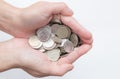 Female hands holding Russian iron coins close up isolator on a white background. a bunch of Russian coins. Russia crisis. small Royalty Free Stock Photo