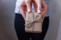 Female hands holding small gift box Royalty Free Stock Photo