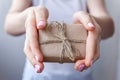 Female hands holding small gift box Royalty Free Stock Photo