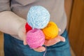 Female hands holding stitching, yarn, ingrain, thread in the form of heart close up. materials for handmade and Royalty Free Stock Photo