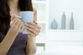 Female hands holding tea cup Royalty Free Stock Photo