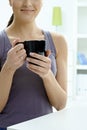 Female hands holding tea cup Royalty Free Stock Photo