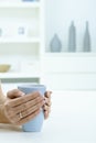 Female hands holding tea cup Royalty Free Stock Photo