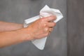 Female hands holding white towel