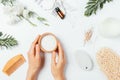 Female hands holding wooden bowl with sea bath salt Royalty Free Stock Photo