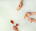 Female hands illustrating stages of making peanut butter and jelly sandwich, top view, copy space Royalty Free Stock Photo