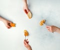 Female hands illustrating stages of making peanut butter and jelly sandwich, top view Royalty Free Stock Photo