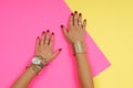 Female hands with jewelry. Fashion accessories, wrist watches, glamor bracelets Royalty Free Stock Photo