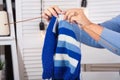 Female hands knit a sweater with knitting needles. Hobby. Royalty Free Stock Photo