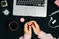 Female Hands with Macaroons Coffee Laptop on Black Background H Royalty Free Stock Photo