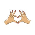 Female hands make a heart shape