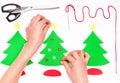 Female hands making Christmas greeting cards on white Royalty Free Stock Photo