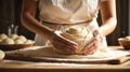 Female hands making dough. Hands kneading bread dough on a cutting board. Home bread. Royalty Free Stock Photo