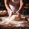Female hands making dough. Hands kneading bread dough on a cutting board Royalty Free Stock Photo