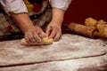 Female hands making dough for pizza. Making bread Royalty Free Stock Photo