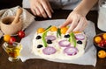 female hands making italian focaccia art bread