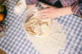 Female hands making yeast pizza dough, kneading dough for homemade bread, Royalty Free Stock Photo