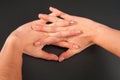 Female hands manicure on a black background. studio isolate. Royalty Free Stock Photo