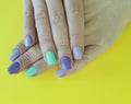 Female hands manicure nails fashionable a colored trend summer