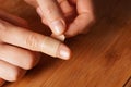 Female hands and a medical plaster on the finger Royalty Free Stock Photo