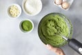 female hands mixing dough with mixer in bowl Royalty Free Stock Photo