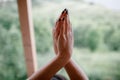 Interlacing hands. female hands on nature background